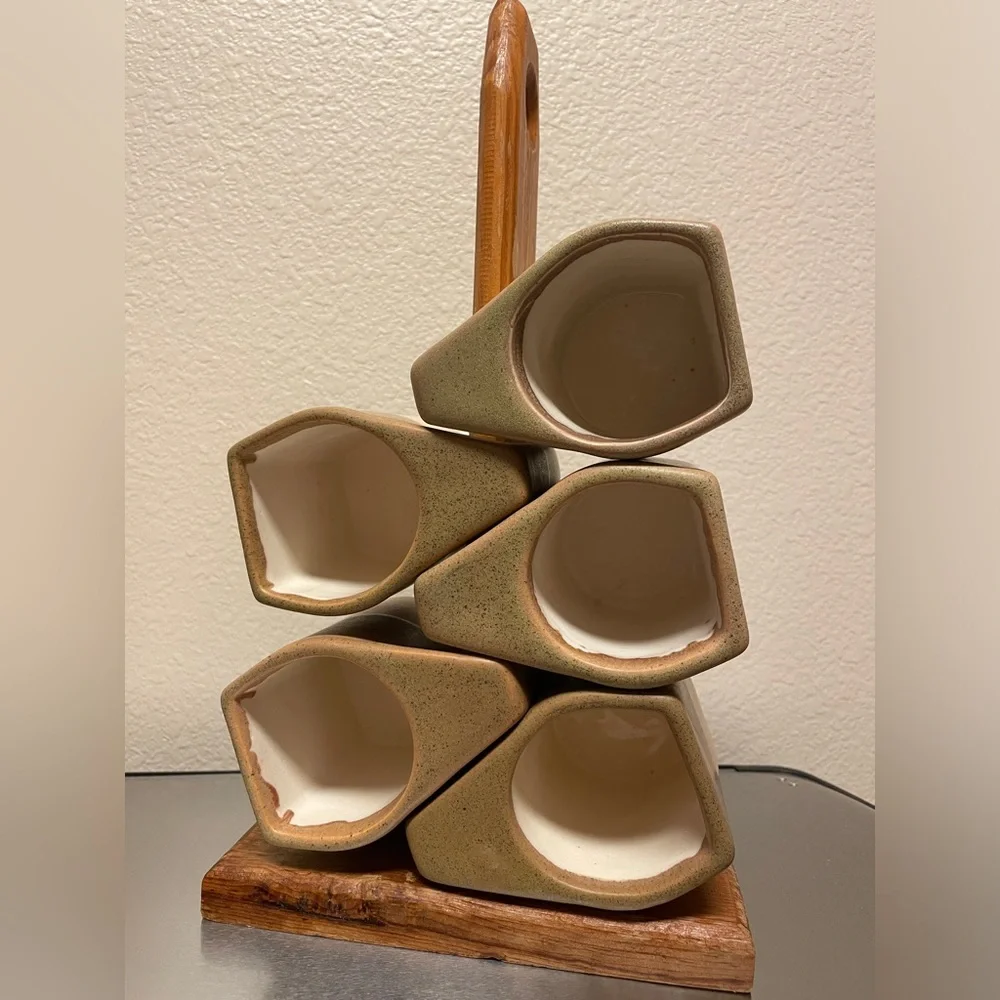 Rodolfo Padilla stacking mugs